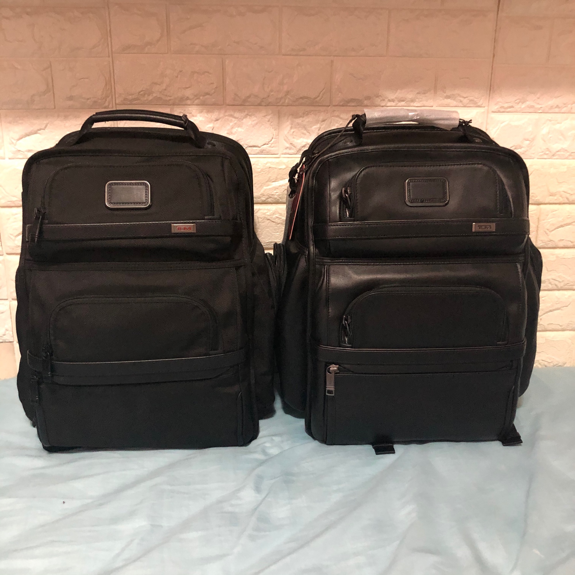 tumi brief backpack