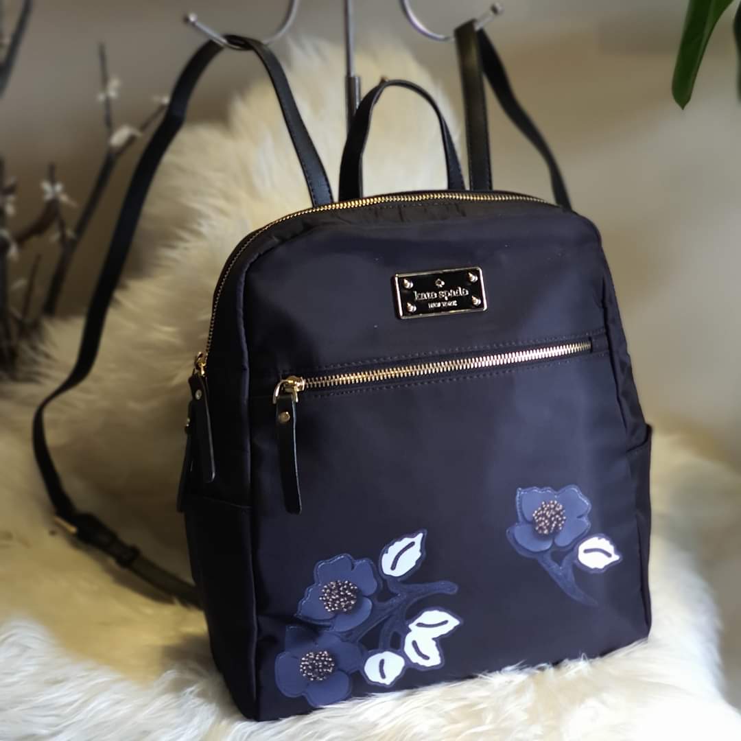 kate spade backpack with side pockets